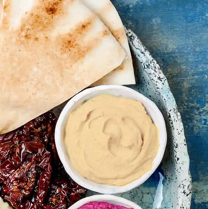dried tomatoes, pita and hummus